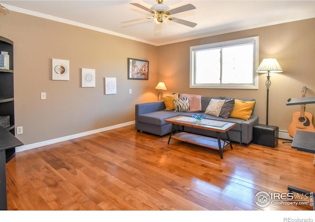 1960 Colard Ln, Lyons, CO 80540 - living area featuring ornamental molding, light wood-type flooring, ceiling fan, and baseboard heating