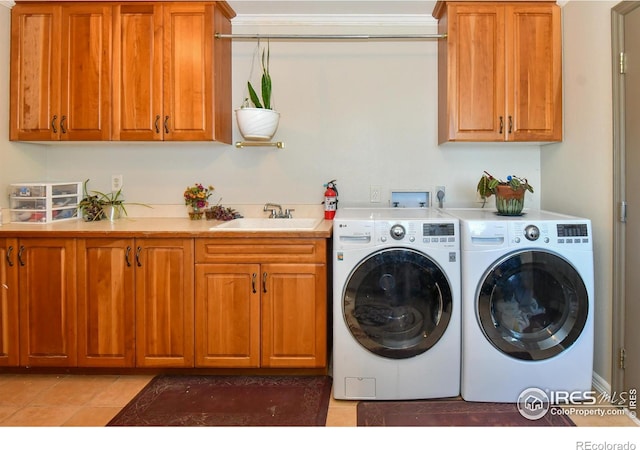 1960 Colard Ln, Lyons, CO 80540 - laundry room featuring cabinet space, washing machine and clothes dryer, and light tile patterned floors