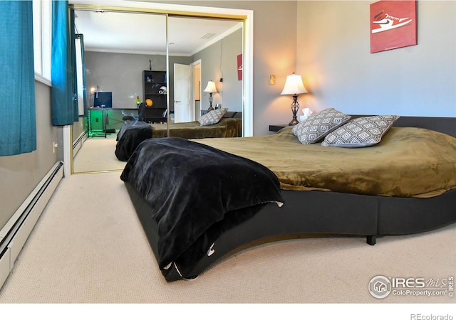 1960 Colard Ln, Lyons, CO 80540 - carpeted bedroom featuring a baseboard heating unit, crown molding, and a closet