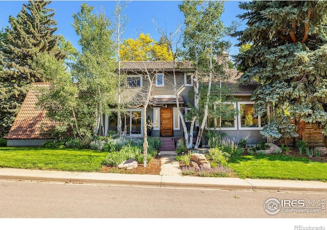 3490 16th St, Boulder, CO 80304 - view of front facade with stucco siding and a front lawn