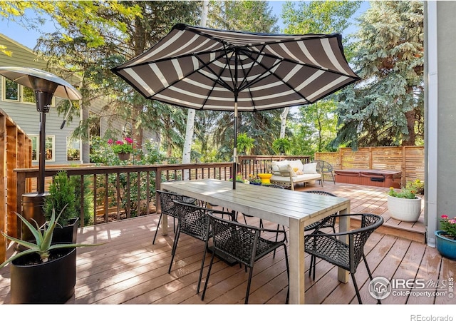 3490 16th St, Boulder, CO 80304 - wooden deck featuring a hot tub and outdoor dining area