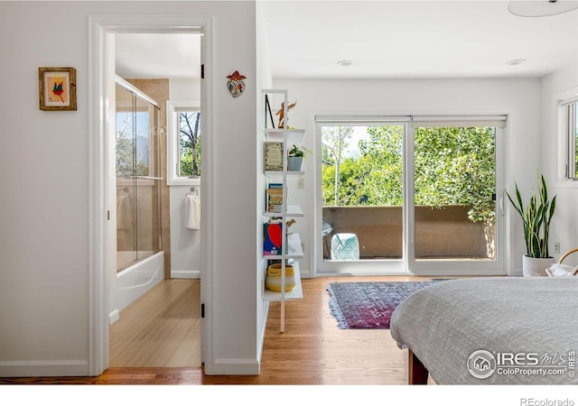 3490 16th St, Boulder, CO 80304 - bedroom featuring access to outside and wood finished floors