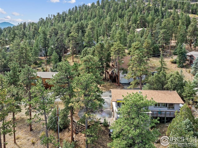 621 Landers St, Estes Park, CO 80517 - aerial view of property and surrounding area featuring a forest and mountains