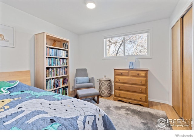 3635 Buckeye Ct, Boulder, CO 80304 - bedroom with wood finished floors and a closet