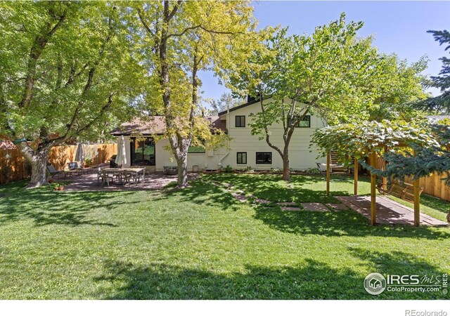 3635 Buckeye Ct, Boulder, CO 80304 - fenced backyard featuring a patio area
