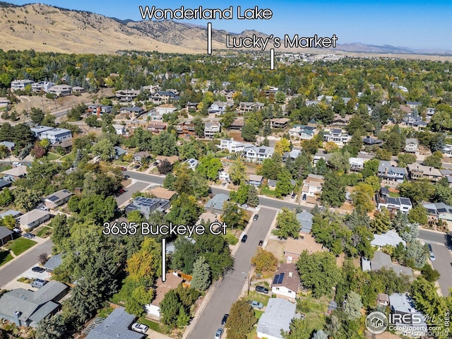 3635 Buckeye Ct, Boulder, CO 80304 - aerial view of property's location with a mountain backdrop and nearby suburban area