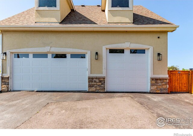 1451 Red Fox Cir, Severance, CO 80550 - garage with concrete driveway