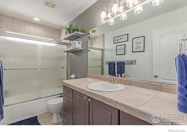 1451 Red Fox Cir, Severance, CO 80550 - full bathroom with vanity, combined bath / shower with glass door, and tile patterned floors