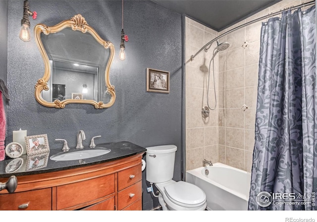 1451 Red Fox Cir, Severance, CO 80550 - bathroom with vanity, shower / bath combo with shower curtain, and a textured wall