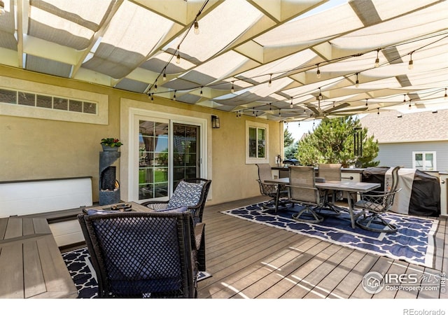 1451 Red Fox Cir, Severance, CO 80550 - deck featuring outdoor dining area, a pergola, and grilling area