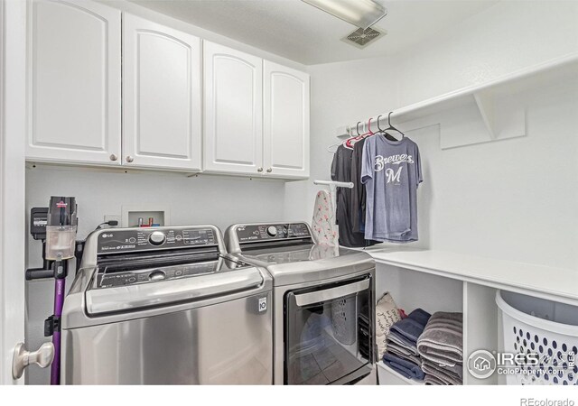 1451 Red Fox Cir, Severance, CO 80550 - washroom with independent washer and dryer and cabinet space