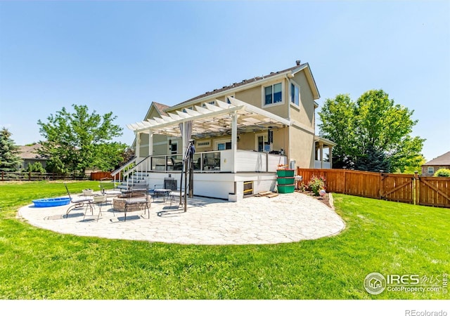 1451 Red Fox Cir, Severance, CO 80550 - rear view of property featuring a patio, an outdoor fire pit, a pergola, a fenced backyard, and stucco siding