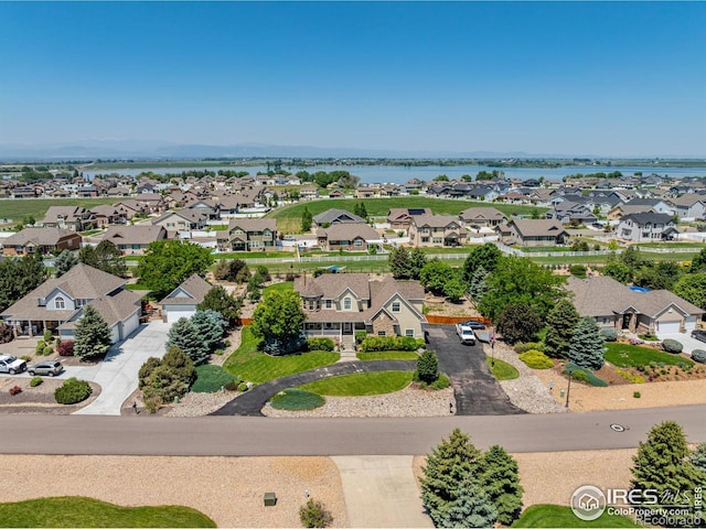 1451 Red Fox Cir, Severance, CO 80550 - aerial perspective of suburban area featuring a nearby body of water