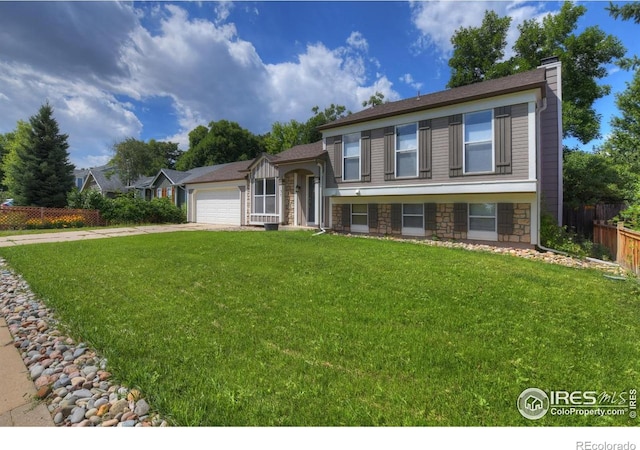 137 S Polk Ave, Louisville, CO 80027 - tri-level home featuring stone siding, a chimney, an attached garage, and driveway