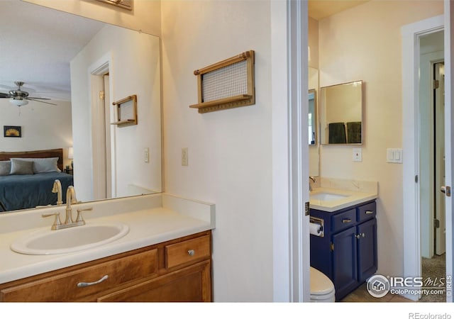 137 S Polk Ave, Louisville, CO 80027 - bathroom with vanity, ensuite bathroom, and a ceiling fan
