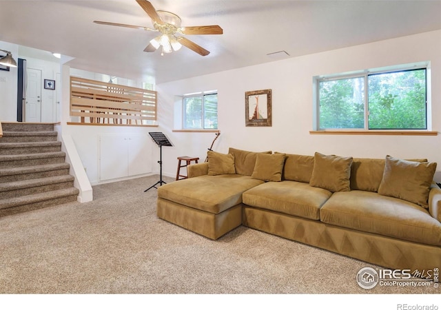 137 S Polk Ave, Louisville, CO 80027 - living area featuring carpet flooring, a ceiling fan, and stairway