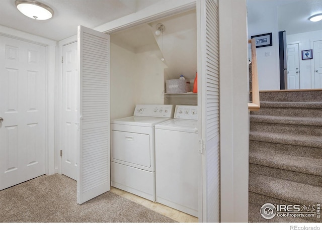 137 S Polk Ave, Louisville, CO 80027 - laundry room featuring washing machine and clothes dryer and light carpet