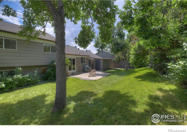 137 S Polk Ave, Louisville, CO 80027 - view of yard featuring a patio area