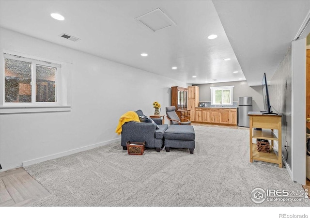110 50th Ave, Greeley, CO 80634 - living area featuring recessed lighting and light carpet