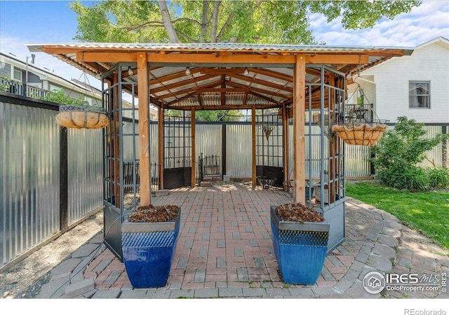 110 50th Ave, Greeley, CO 80634 - fenced backyard with a gazebo and a patio area
