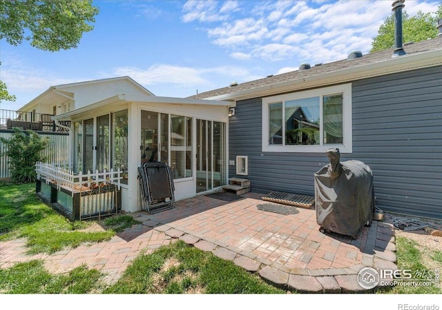 110 50th Ave, Greeley, CO 80634 - view of patio featuring a sunroom