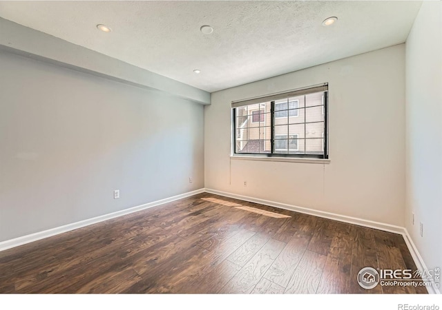 4771 White Rock Cir Unit B, Boulder, CO 80301 - spare room featuring wood finished floors, recessed lighting, and a textured ceiling
