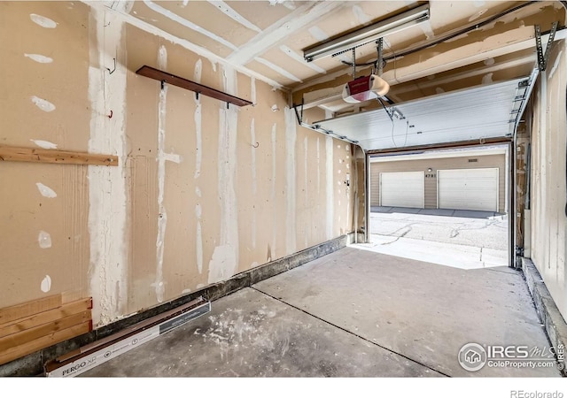4771 White Rock Cir Unit B, Boulder, CO 80301 - garage featuring a garage door opener