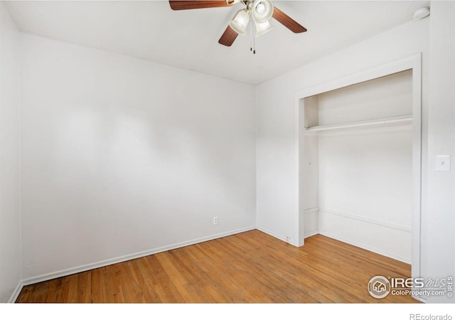 1512 Brentwood Dr, Fort Collins, CO 80521 - unfurnished bedroom featuring wood finished floors, a closet, and ceiling fan