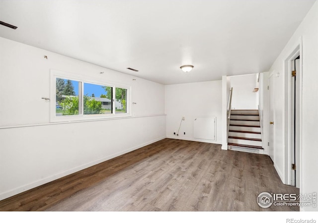 1512 Brentwood Dr, Fort Collins, CO 80521 - below grade area featuring stairs and wood finished floors