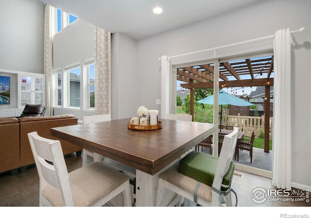 6420 Tuxedo Park Rd, Timnath, CO 80547 - dining area featuring wood finished floors and recessed lighting