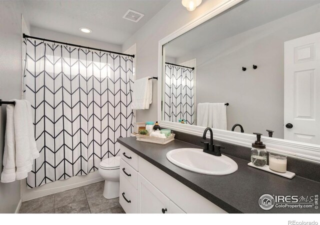 6420 Tuxedo Park Rd, Timnath, CO 80547 - full bathroom with vanity, tile patterned floors, curtained shower, and recessed lighting