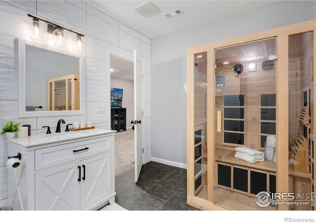 6420 Tuxedo Park Rd, Timnath, CO 80547 - full bath featuring a relaxing sauna, vanity, tile patterned flooring, and a shower