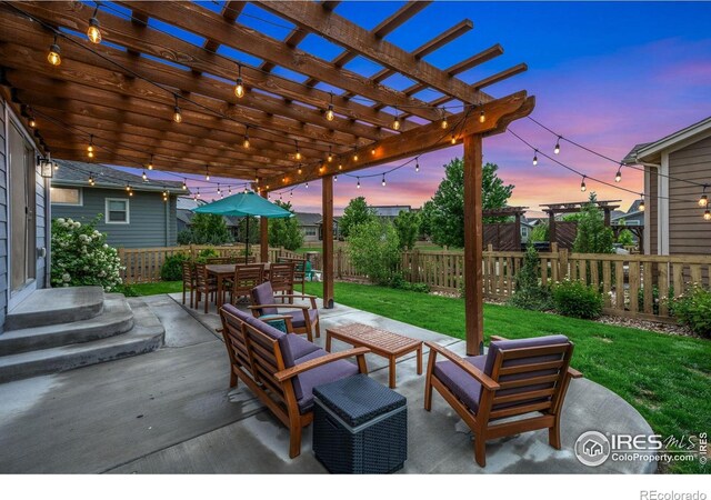 6420 Tuxedo Park Rd, Timnath, CO 80547 - fenced backyard with an outdoor hangout area, a patio area, and a pergola