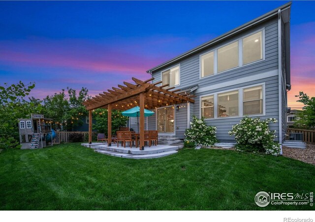 6420 Tuxedo Park Rd, Timnath, CO 80547 - back of house with a pergola and a patio area