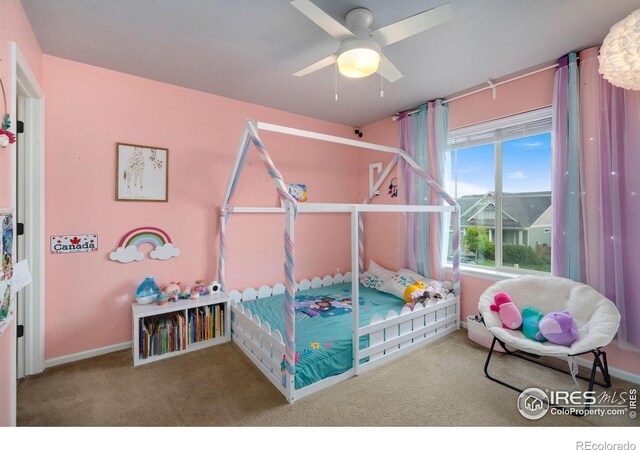 6420 Tuxedo Park Rd, Timnath, CO 80547 - carpeted bedroom featuring a ceiling fan and baseboards