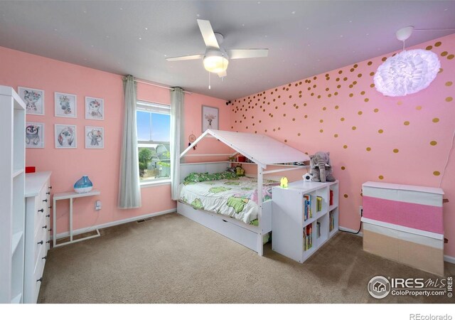 6420 Tuxedo Park Rd, Timnath, CO 80547 - carpeted bedroom with baseboards and ceiling fan