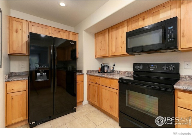 3145 Alybar Dr # 16B, Wellington, CO 80549 - kitchen with black appliances, light tile patterned floors, light brown cabinetry, and recessed lighting