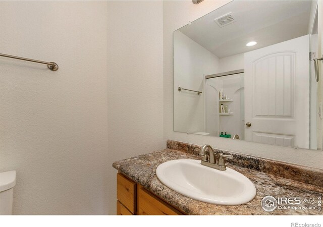 3145 Alybar Dr # 16B, Wellington, CO 80549 - bathroom featuring vanity and toilet
