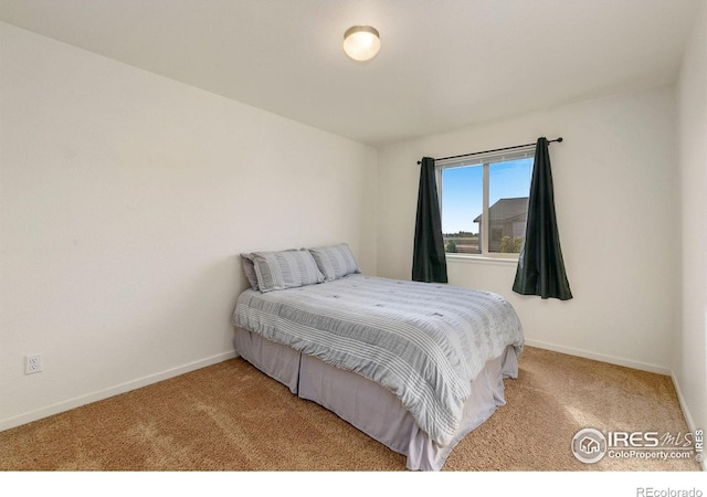 3145 Alybar Dr # 16B, Wellington, CO 80549 - carpeted bedroom featuring baseboards