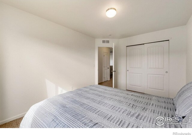 3145 Alybar Dr # 16B, Wellington, CO 80549 - carpeted bedroom featuring baseboards and a closet
