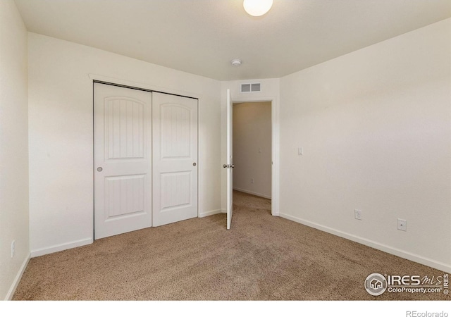 3145 Alybar Dr # 16B, Wellington, CO 80549 - unfurnished bedroom with carpet floors and a closet