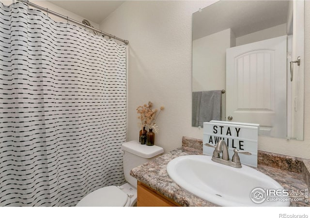 3145 Alybar Dr # 16B, Wellington, CO 80549 - full bathroom featuring vanity and a shower with shower curtain
