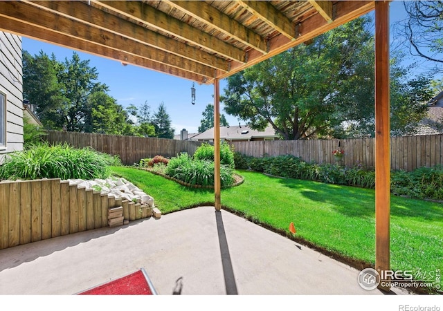 4222 W 22nd Street Rd, Greeley, CO 80634 - fenced backyard featuring a patio