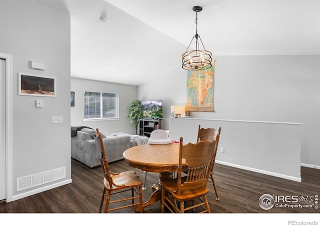 1144-1148 E 5th St, Loveland, CO 80537 - dining room with wood finished floors and vaulted ceiling