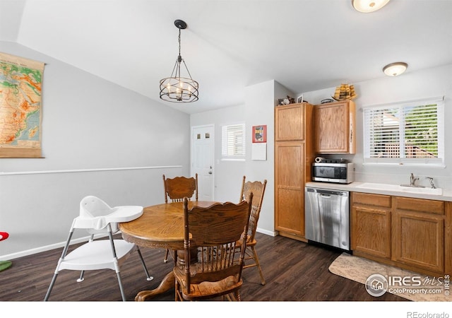1144-1148 E 5th St, Loveland, CO 80537 - dining space featuring dark wood finished floors, plenty of natural light, and lofted ceiling