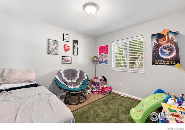 1144-1148 E 5th St, Loveland, CO 80537 - bedroom featuring carpet flooring and baseboards