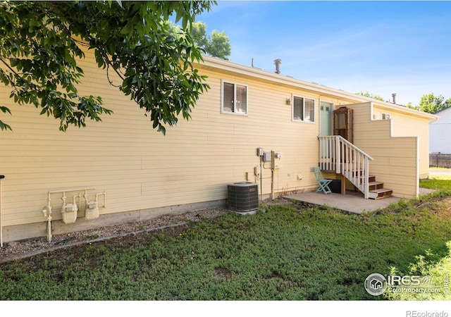 1144-1148 E 5th St, Loveland, CO 80537 - rear view of property with a patio area