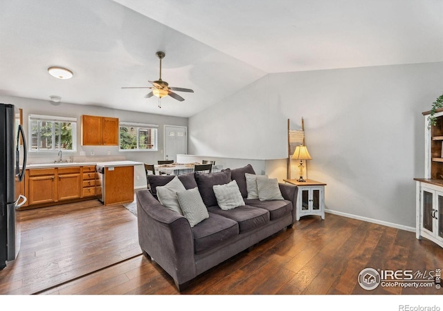 1144-1148 E 5th St, Loveland, CO 80537 - living room featuring dark wood-style flooring, a ceiling fan, and lofted ceiling