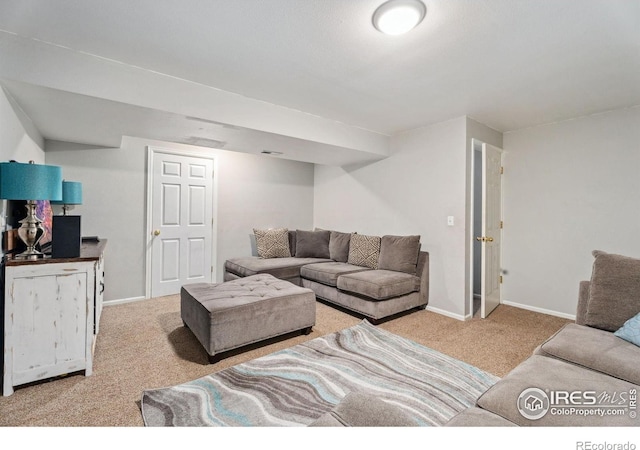 1144-1148 E 5th St, Loveland, CO 80537 - living room featuring carpet flooring and baseboards