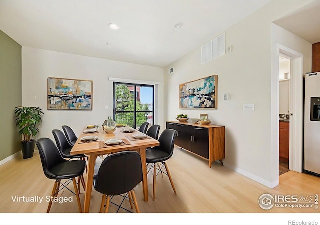 1200 Yarmouth Ave Unit 237, Boulder, CO 80304 - dining area featuring light wood-style floors and recessed lighting
